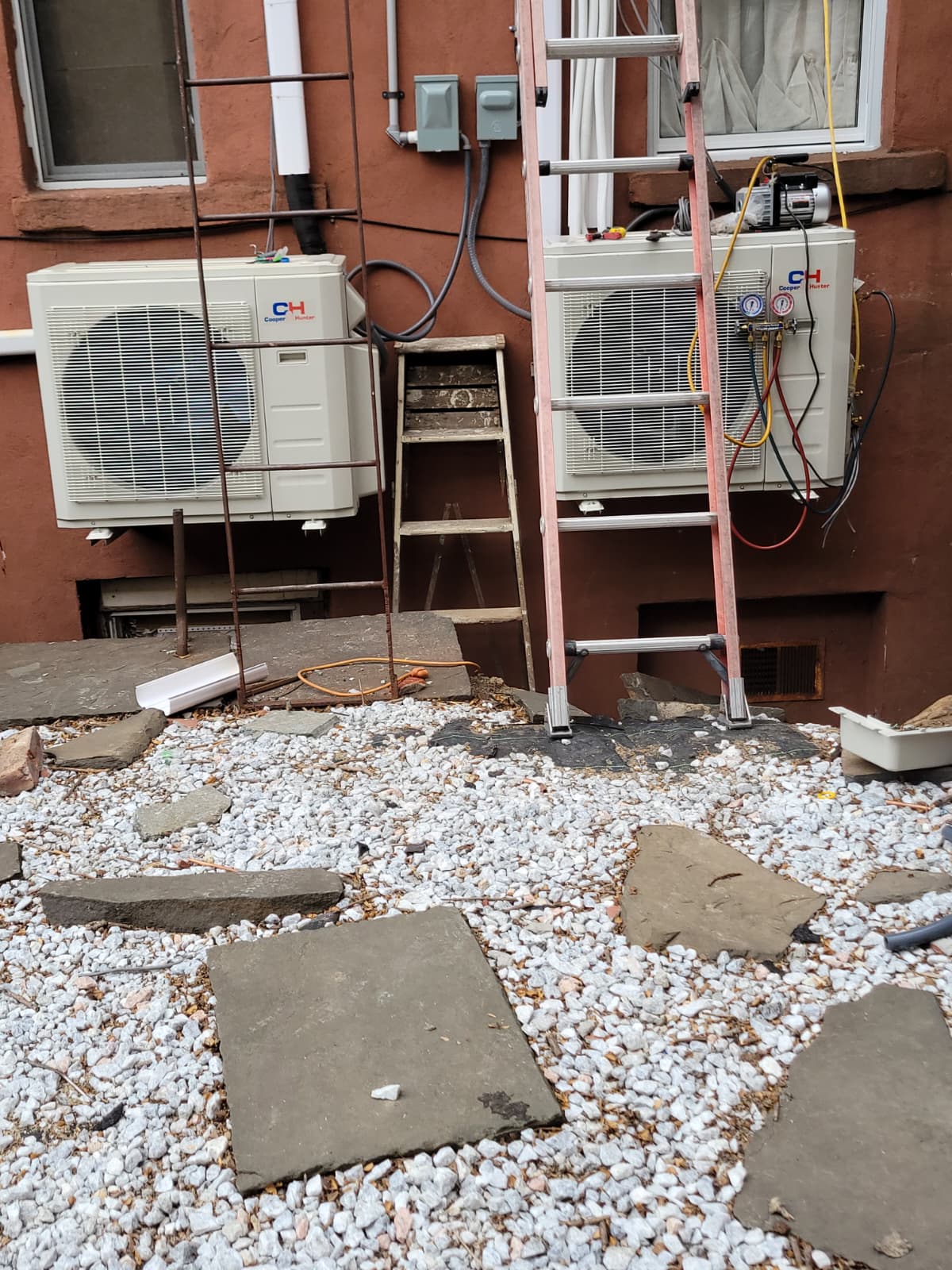 Ductless mini-split head on living room wall
