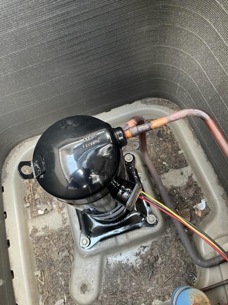 Tech with combustion analyzer, mid-tune-up