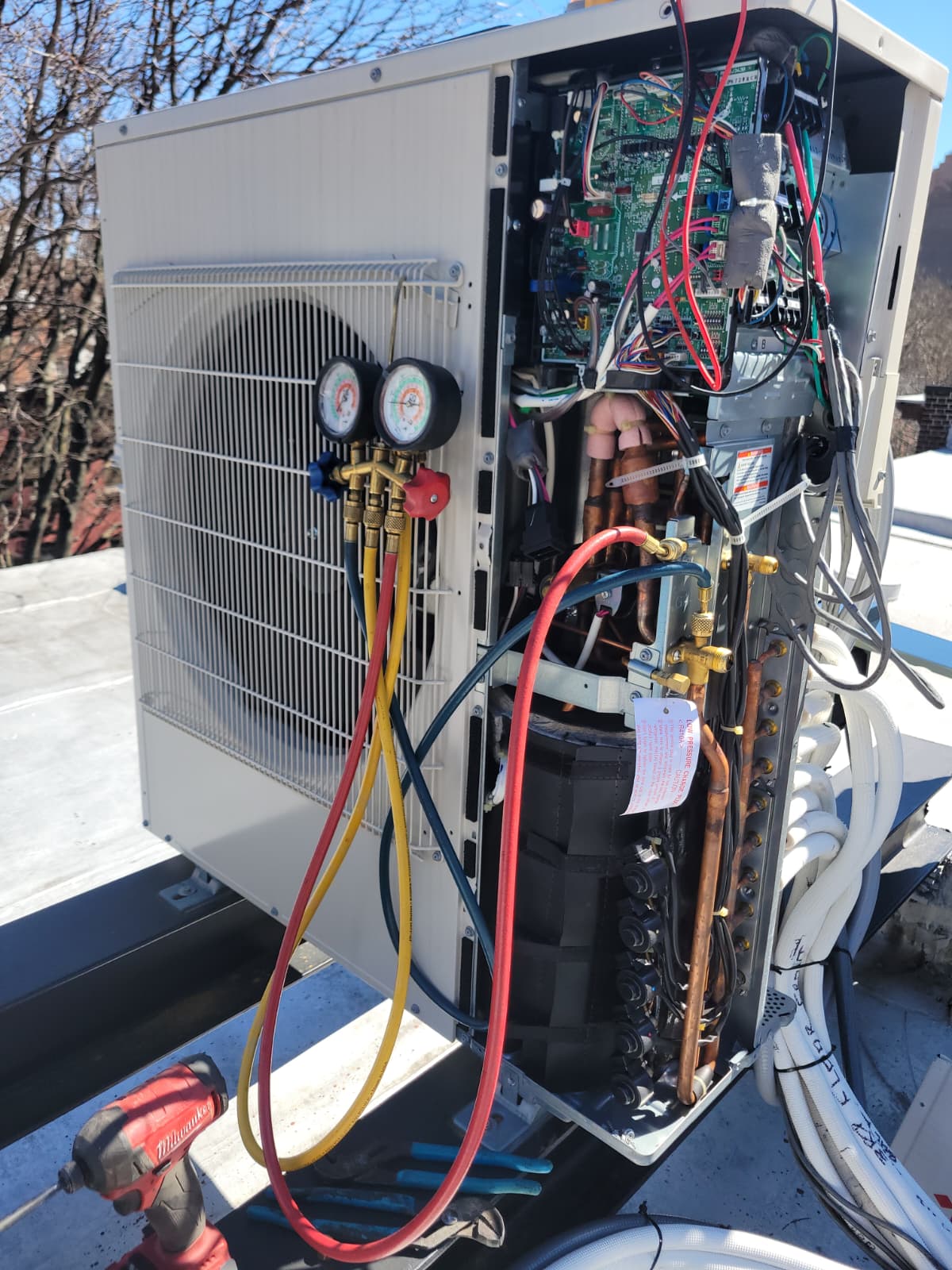 Tech with combustion analyzer mid tune-up